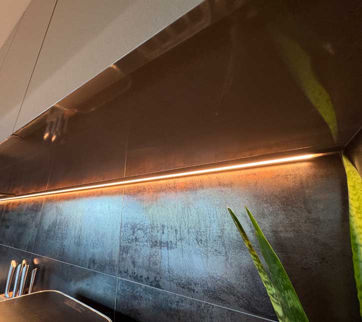 Modern home kitchen lighting by TALR Electrical Services